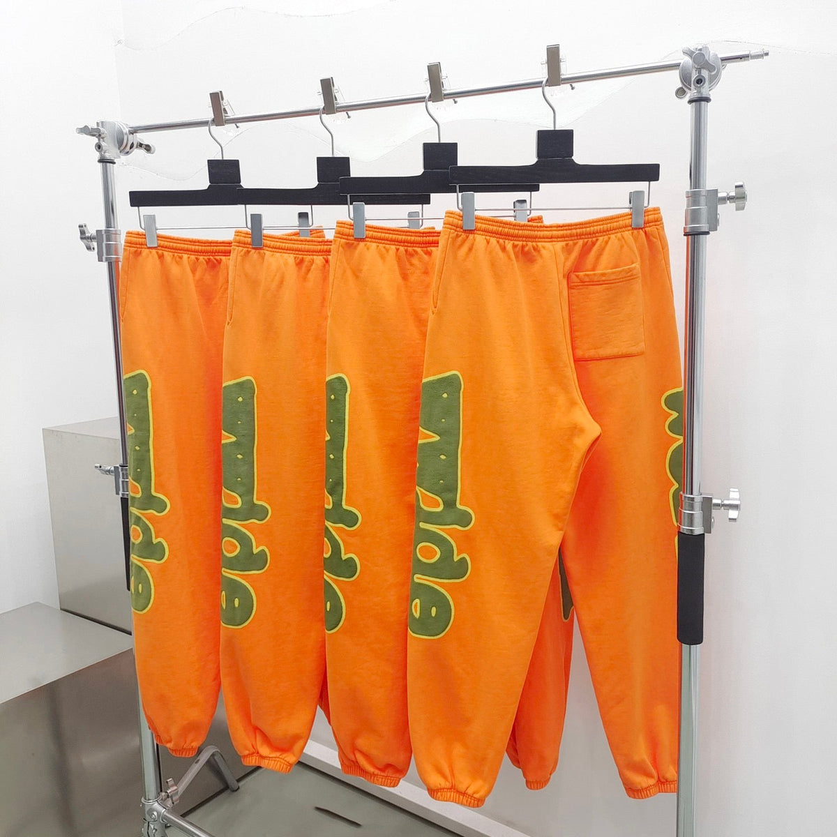Orangefarbene bedruckte Jogginghose aus Baumwolle – Herren