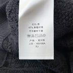 Schwarzer Rollkragenpullover aus Wolle mit Zopfmuster – Herren