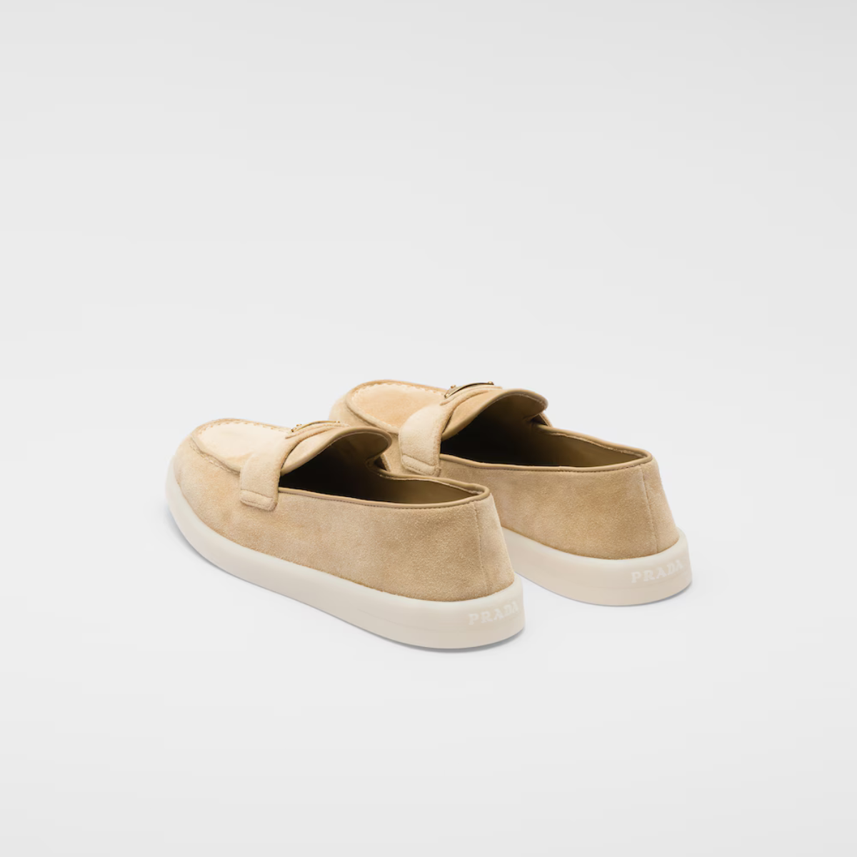 Suede leather loafers – the enameled metal triangle logo embellishes the band, while the rubber sole adds – LUX VERSE Luxury Designer Fashion Outlet