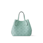 Blossom PM Handbag – made from the Maison’s signature perforated calfskin, this casually sophisticated – LUX VERSE Luxury Designer Fashion Outlet