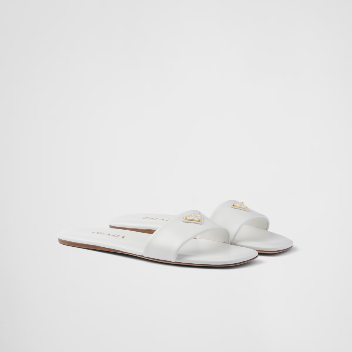 Leather slides – these flat slides with a sleek, contemporary design have a refined, versatile style – LUX VERSE Luxury Designer Fashion Outlet