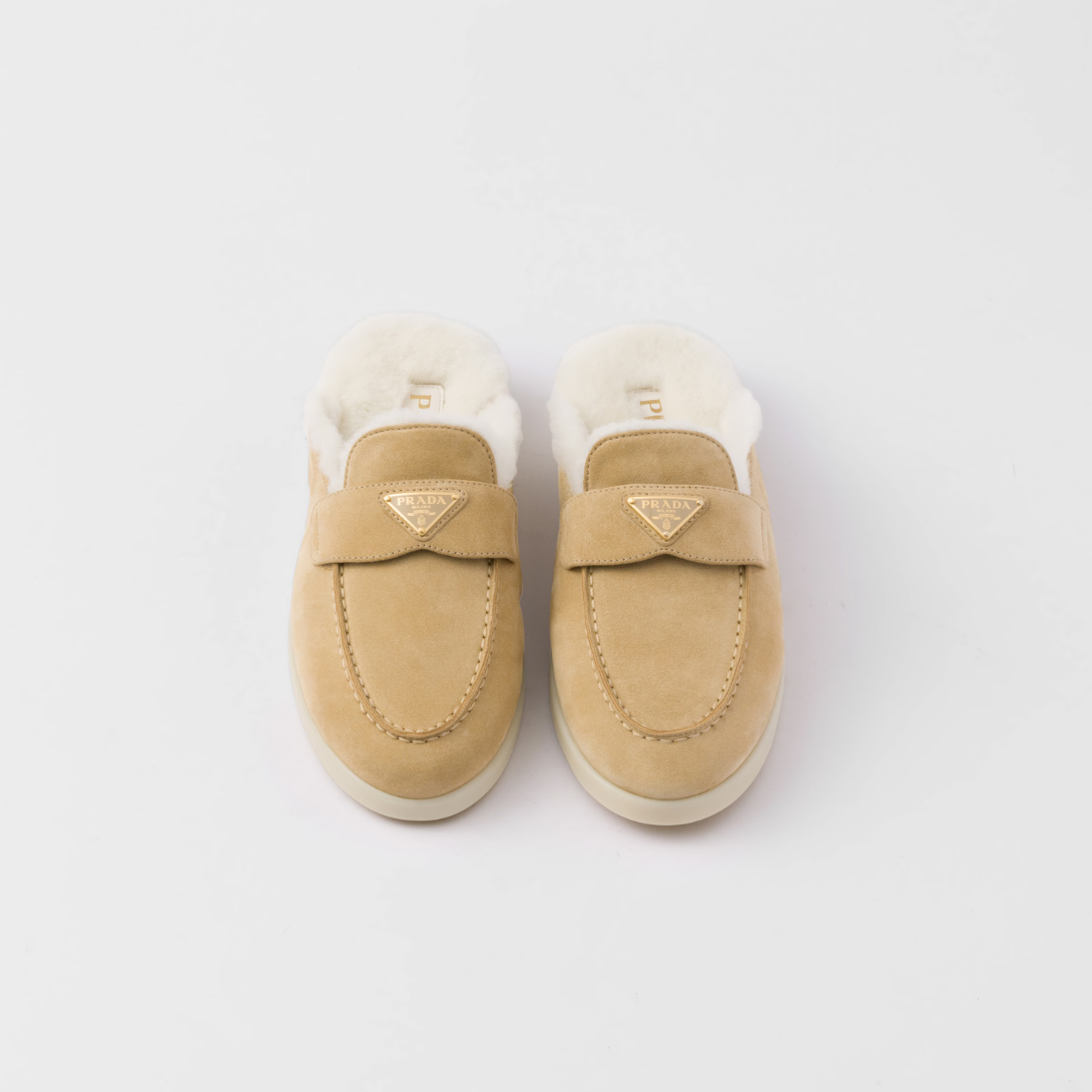 Suede and shearling mules – these suede mules with a sleek, modern silhouette are completed by a soft shearling – LUX VERSE Luxury Designer Fashion Outlet