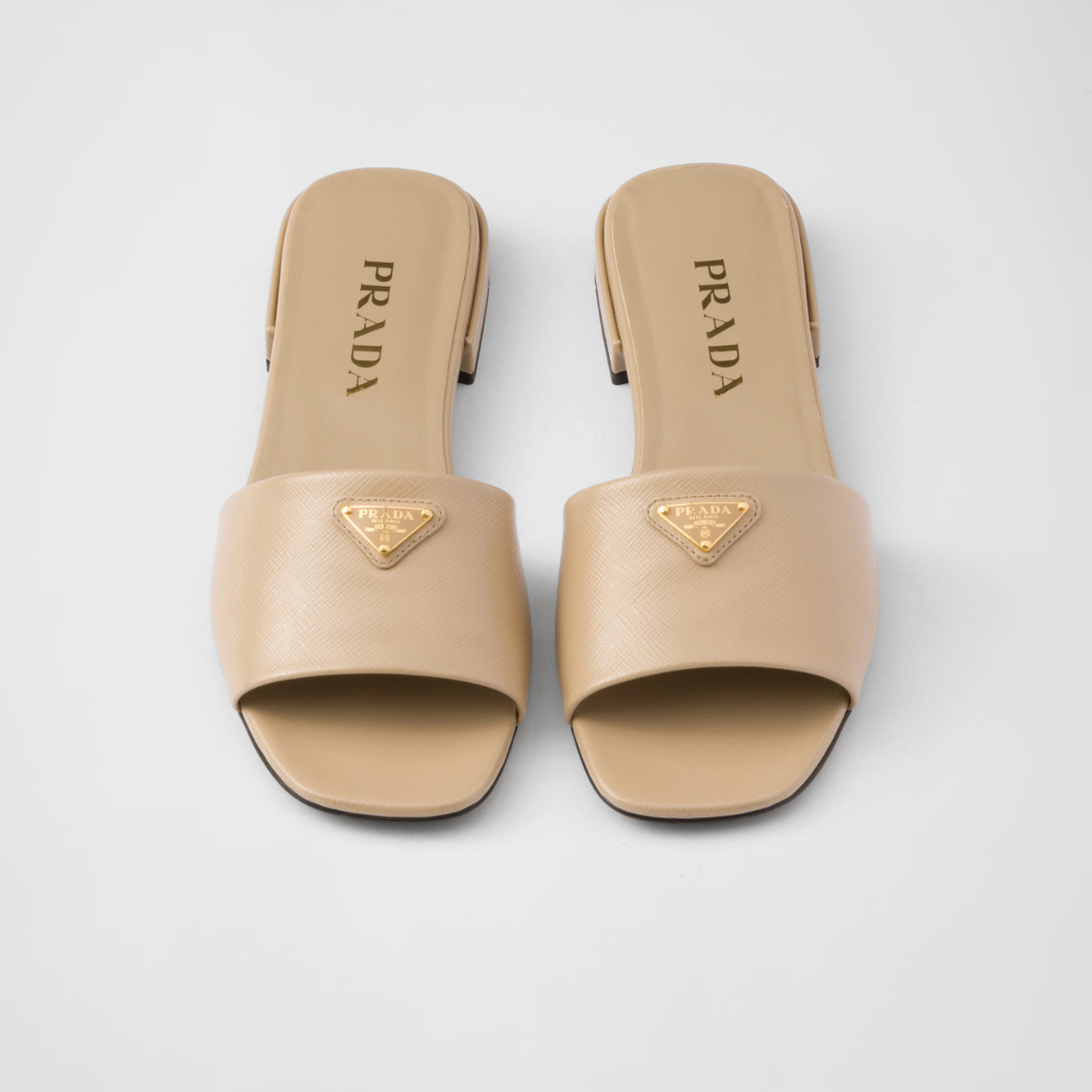 Saffiano patent leather slides – the sophisticated and versatile style defined by clean, sleek lines is enriched – LUX VERSE Luxury Designer Fashion Outlet