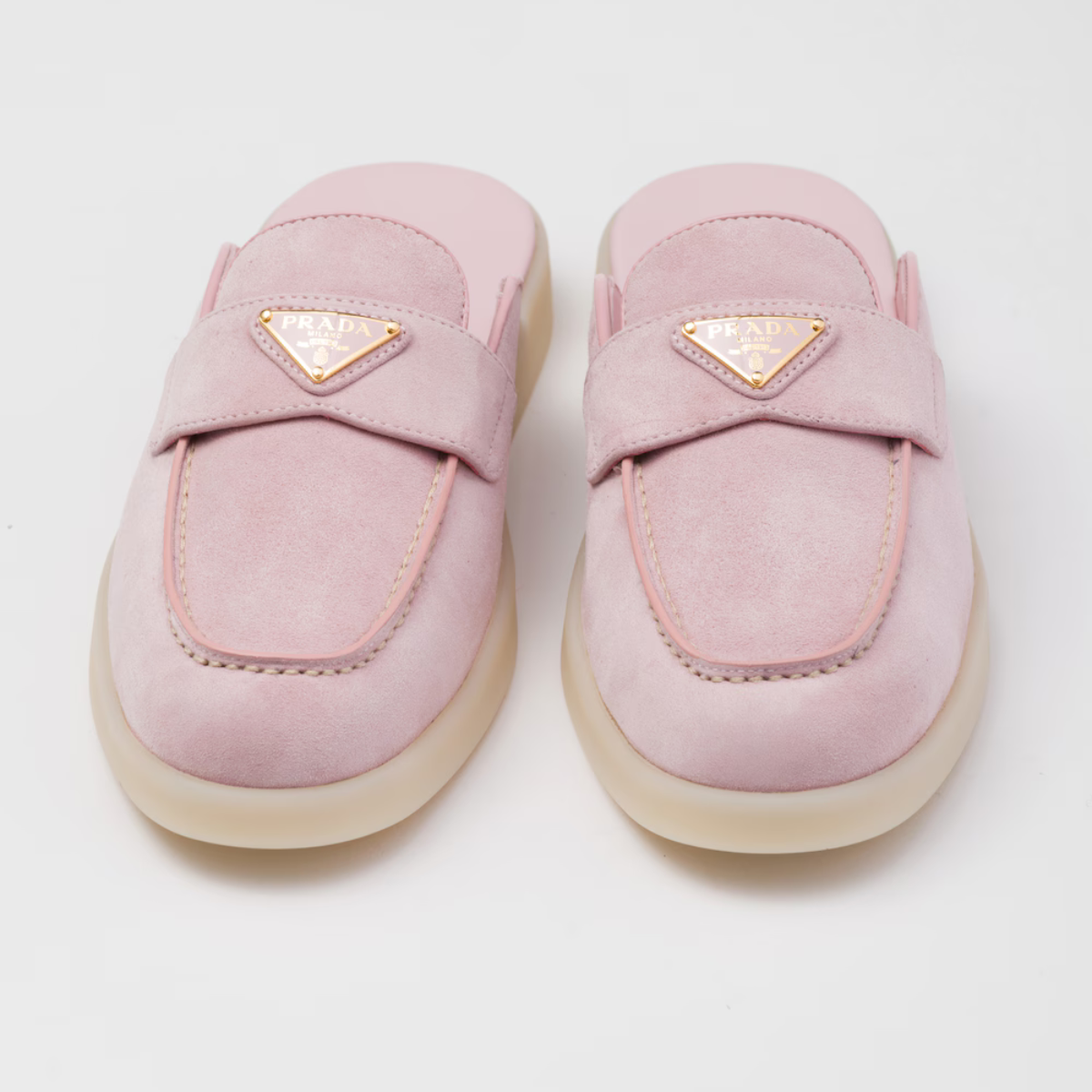 Suede mules – the enameled metal triangle logo embellishes the band, while the rubber sole adds – LUX VERSE Luxury Designer Fashion Outlet