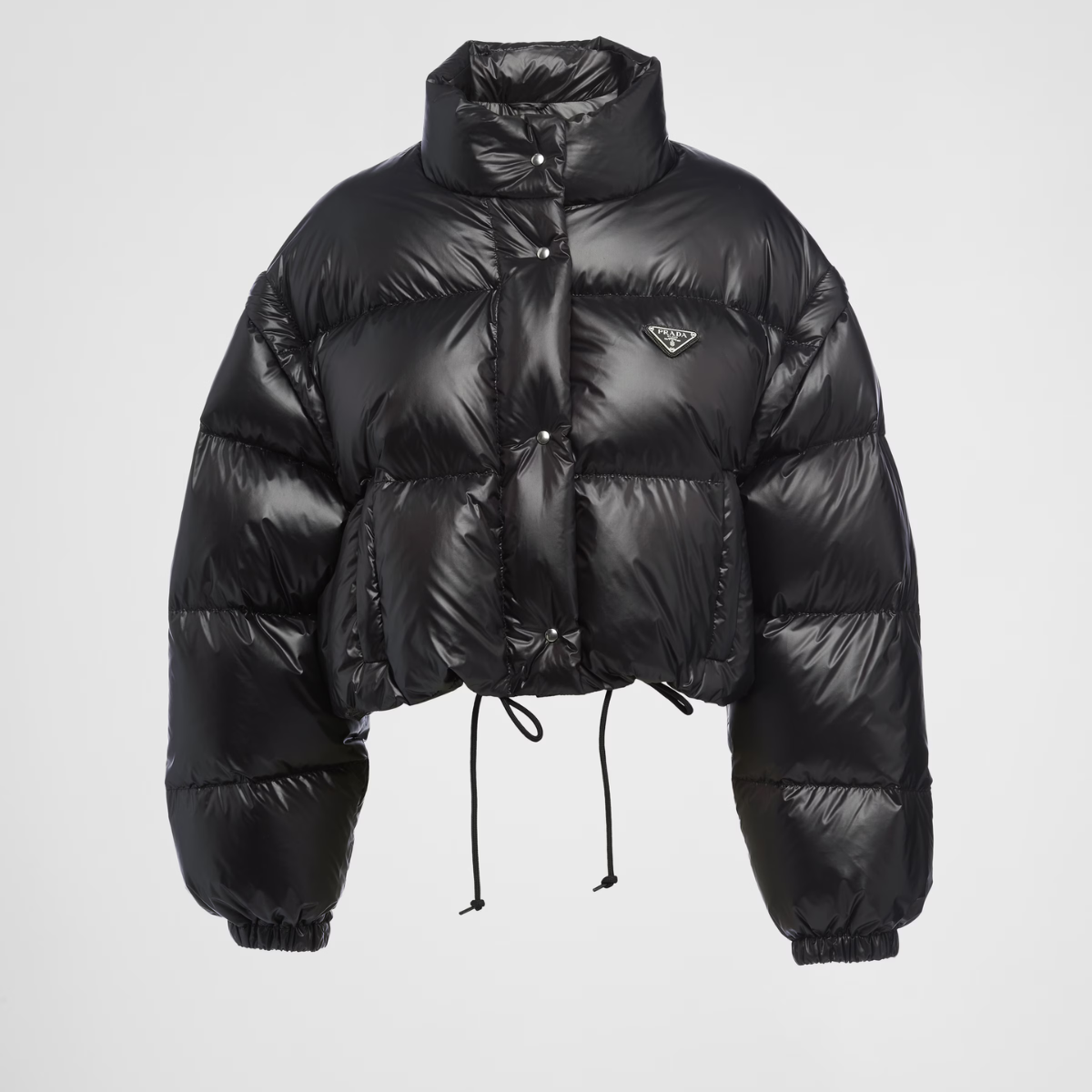 Re-Nylon cropped convertible down jacket – padded with goose down, the garment is decorated with the iconic enameled metal – LUX VERSE Luxury Designer Fashion Outlet