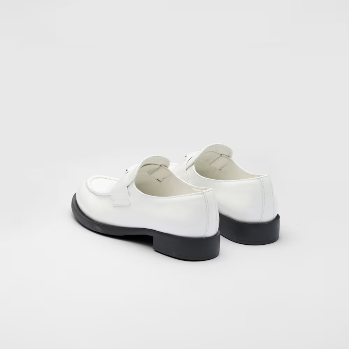 Patent Glossy Finish leather loafers – upper with leather band Enameled metal triangle logo Rubber monoblock sole – LUX VERSE Luxury Designer Fashion Outlet