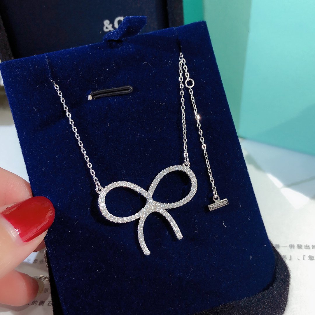 Claw Set Rhodium Plated Bow Necklace – LUX VERSE Luxury Designer Fashion Outlet