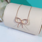 Claw Set Rhodium Plated Bow Necklace – LUX VERSE Luxury Designer Fashion Outlet