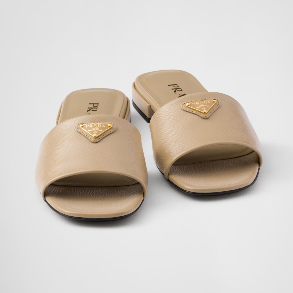 Saffiano patent leather slides – the distinctive crosshatch pattern of Saffiano leather, a signature material – LUX VERSE Luxury Designer Fashion Outlet