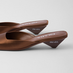 Satin mules – modernist lines and architectural volumes define the silhouette of these satin mules – LUX VERSE Luxury Designer Fashion Outlet