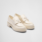 patent leather loafers – the triangle logo, first introduced on trunks designed by Mario, decorates the front – LUX VERSE Luxury Designer Fashion Outlet