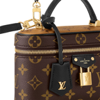 Vanity Chain Pouch – this sophisticated, slim-line bag is complemented by leather trim on its top handle – LUX VERSE Luxury Designer Fashion Outlet