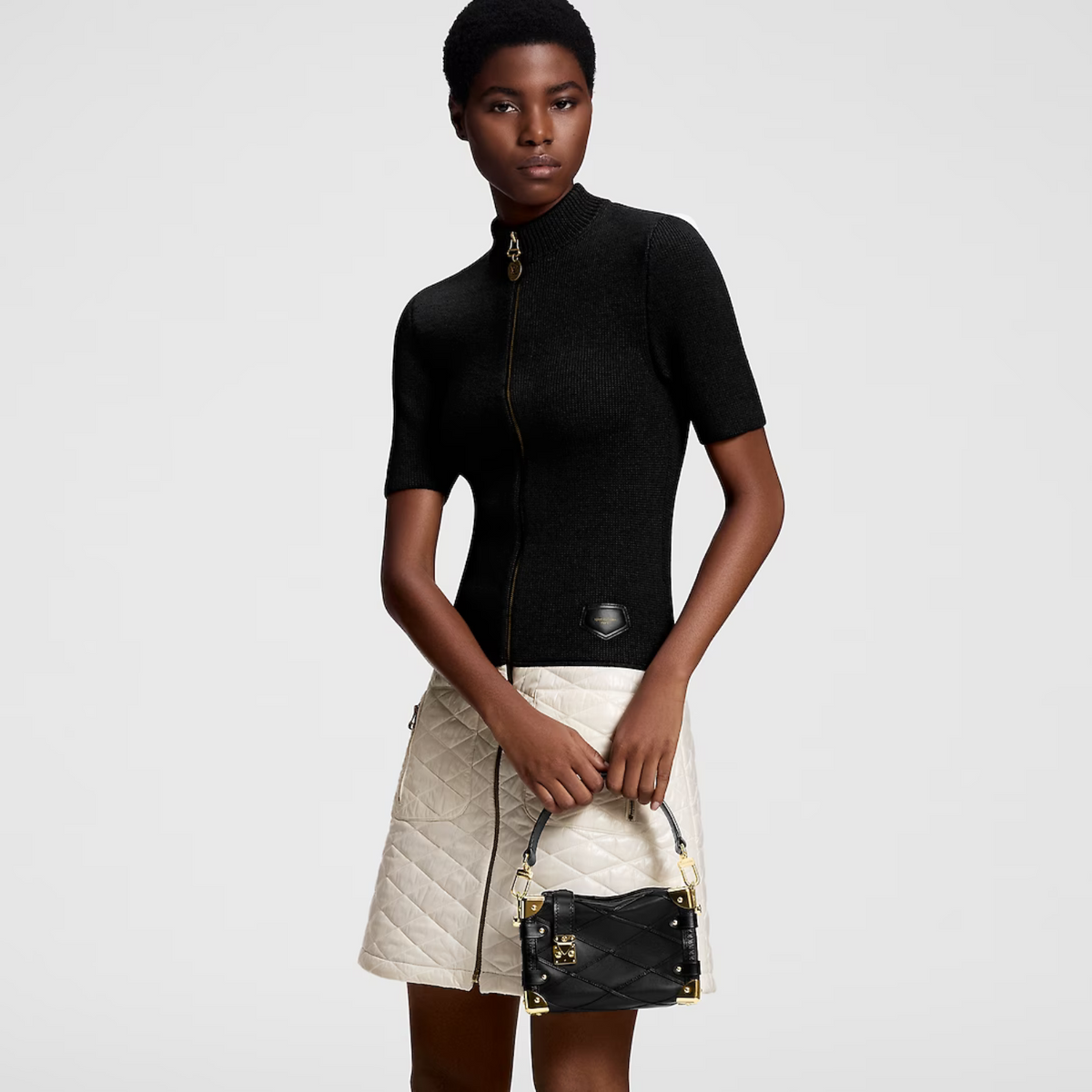 Side Modern Trunk PM – the boxy shape is embellished with gold-color hardware, including the reinforced – LUX VERSE Luxury Designer Fashion Outlet