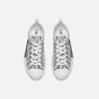 Low-Top Sneaker – the B23 low-top sneaker is set apart by its white and black Oblique motif and – LUX VERSE Luxury Designer Fashion Outlet