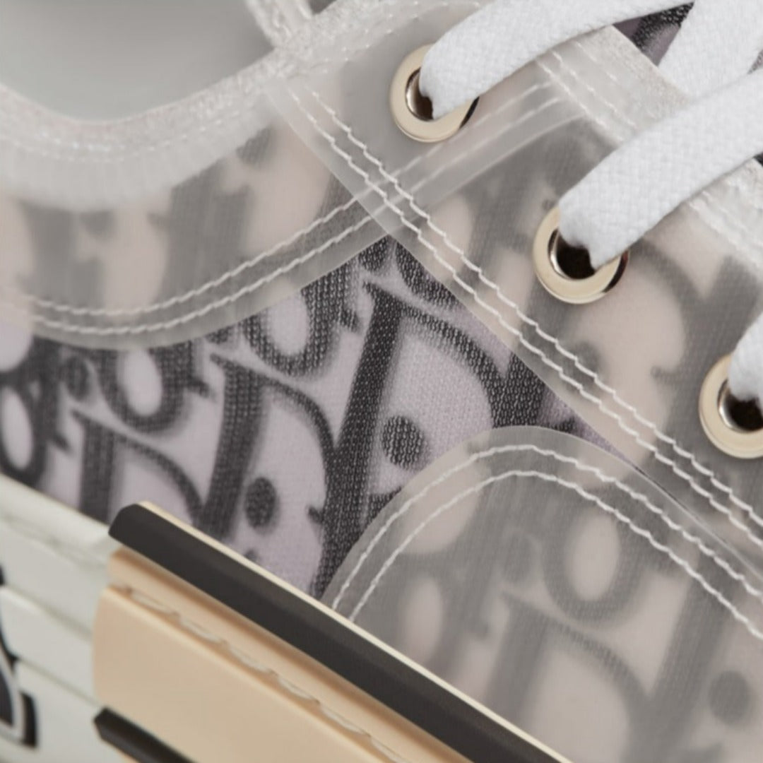 Low-Top Sneaker – the sneaker is further enhanced with contrasting details on the sides, including a – LUX VERSE Luxury Designer Fashion Outlet