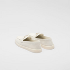 Suede leather loafers – upper with leather band Leather lining Enameled metal triangle logo Rubber sole – LUX VERSE Luxury Designer Fashion Outlet