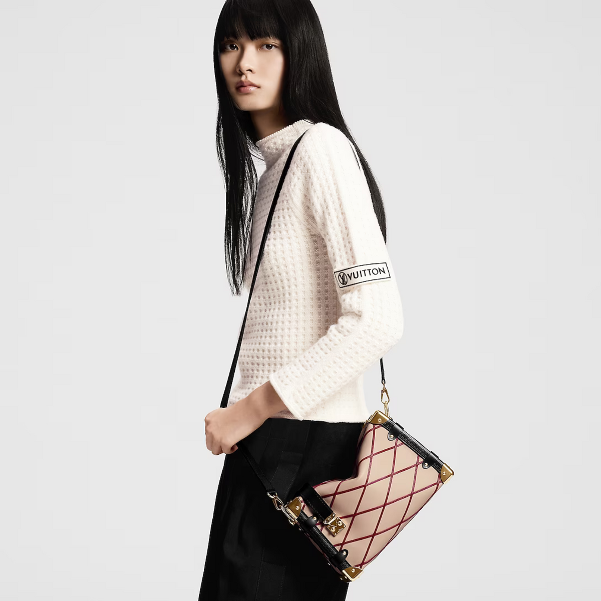 Side Trunk Carrier PM – fashioned from soft, beige lambskin crisscrossed with deep red, it features such – LUX VERSE Luxury Designer Fashion Outlet