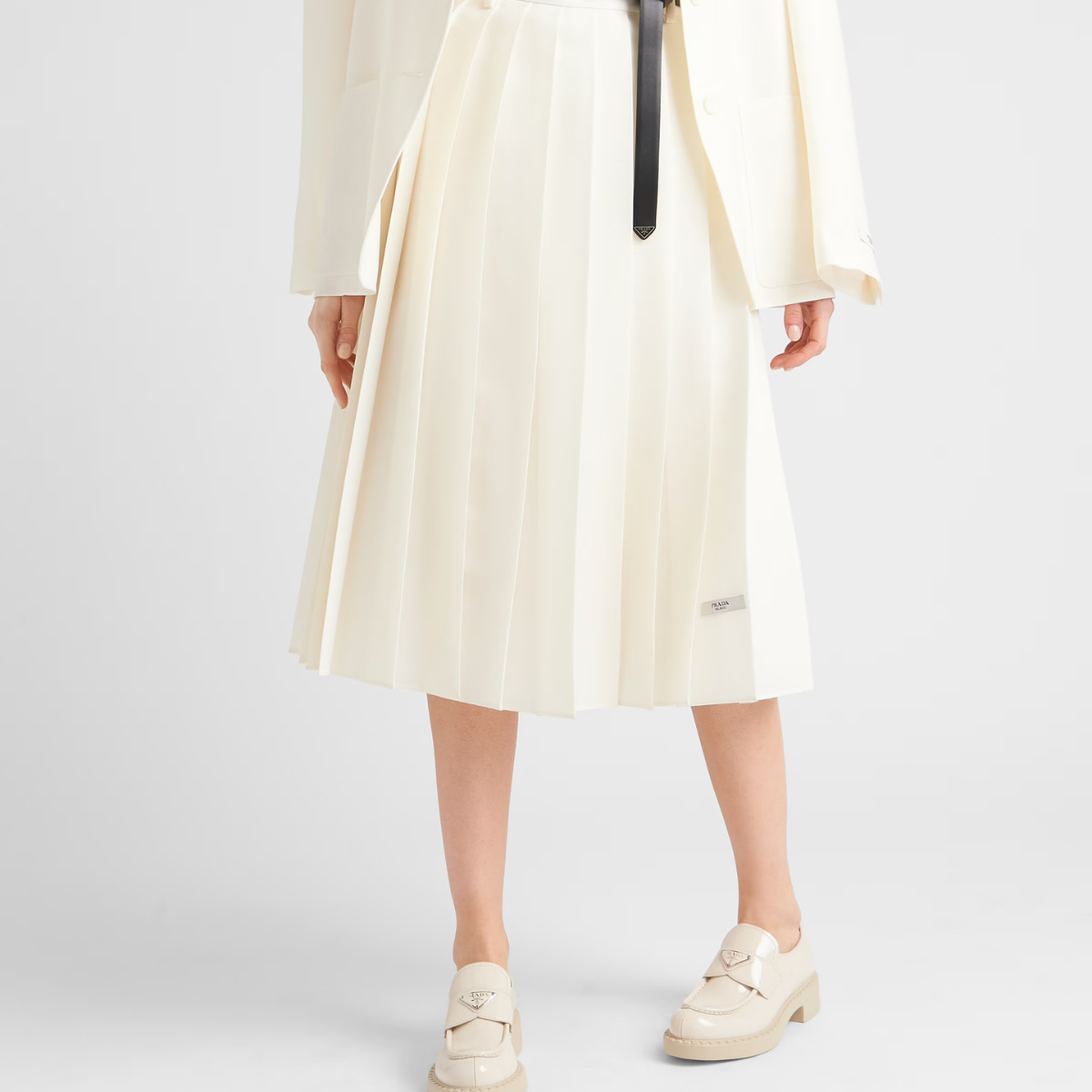patent leather loafers – leather band on the upper Apron with stitched, raised edge Enameled metal triangle – LUX VERSE Luxury Designer Fashion Outlet