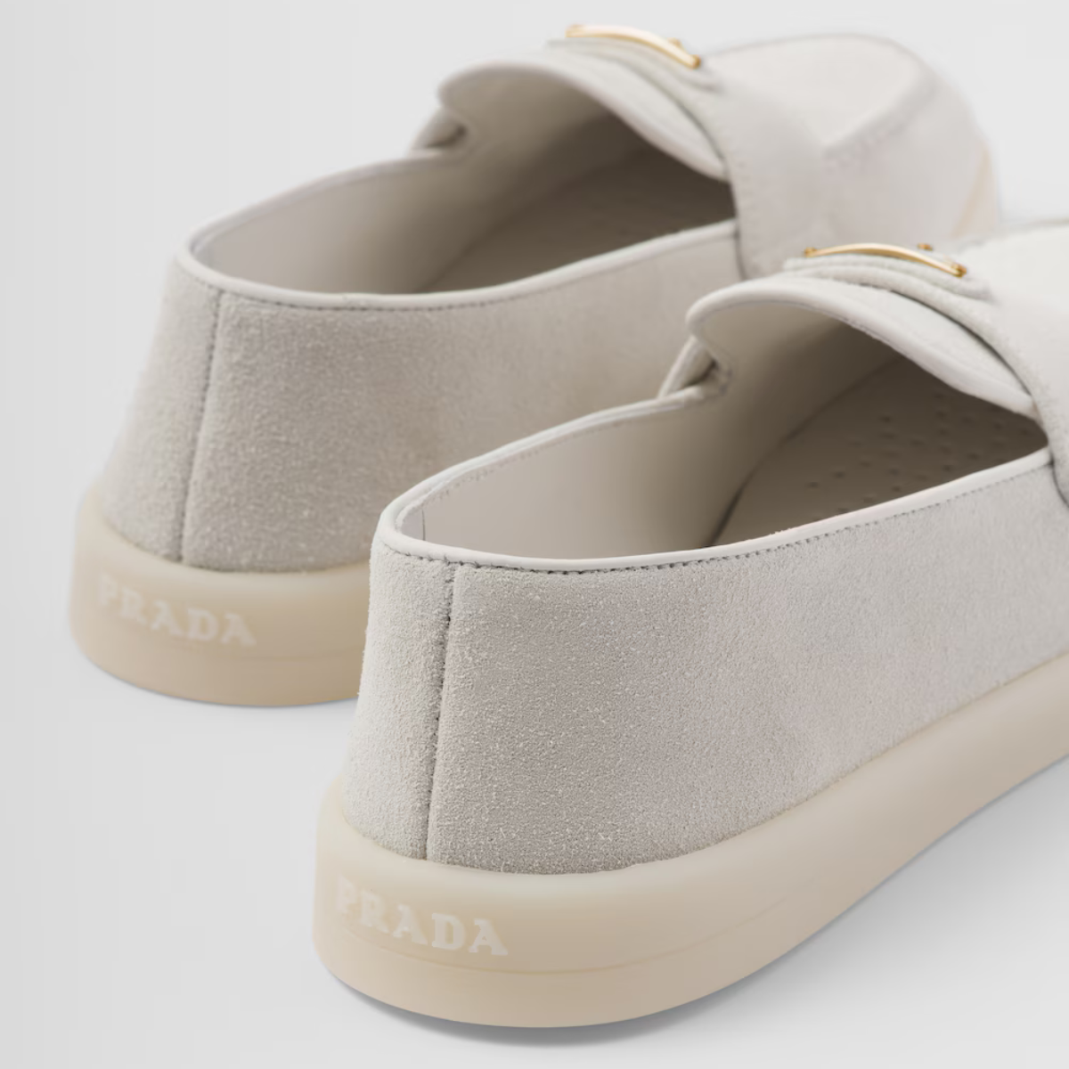 Suede leather loafers – the enameled metal triangle logo embellishes the band, while the rubber sole adds – LUX VERSE Luxury Designer Fashion Outlet
