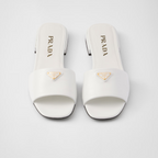 Saffiano patent leather slides – enameled metal triangle logo Leather sole with hot-stamped logo Leather-covered, – LUX VERSE Luxury Designer Fashion Outlet