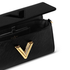 Twist West Pochette – the Twist West Pochette in grained Epi leather is a chic way to carry essentials for – LUX VERSE Luxury Designer Fashion Outlet