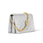 Pochette Coussin Silver – this is further enhanced by the construction of the pouch, which gives it a supple, – LUX VERSE Luxury Designer Fashion Outlet