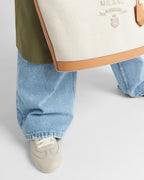 Leather classic sneakers – the casual and versatile style is embellished with the embossed rubber triangle logo – LUX VERSE Luxury Designer Fashion Outlet