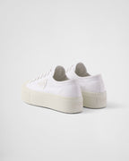 Laced fabric sneakers – the casual and versatile style is embellished with the embossed rubber triangle logo – LUX VERSE Luxury Designer Fashion Outlet