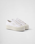 Laced fabric sneakers – upper with rubber toe cap Leather lining--Embossed rubber triangle logo Logo-print – LUX VERSE Luxury Designer Fashion Outlet