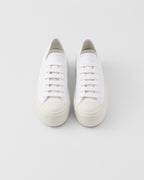 Laced fabric sneakers – upper with rubber toe cap Leather lining--Embossed rubber triangle logo Logo-print – LUX VERSE Luxury Designer Fashion Outlet