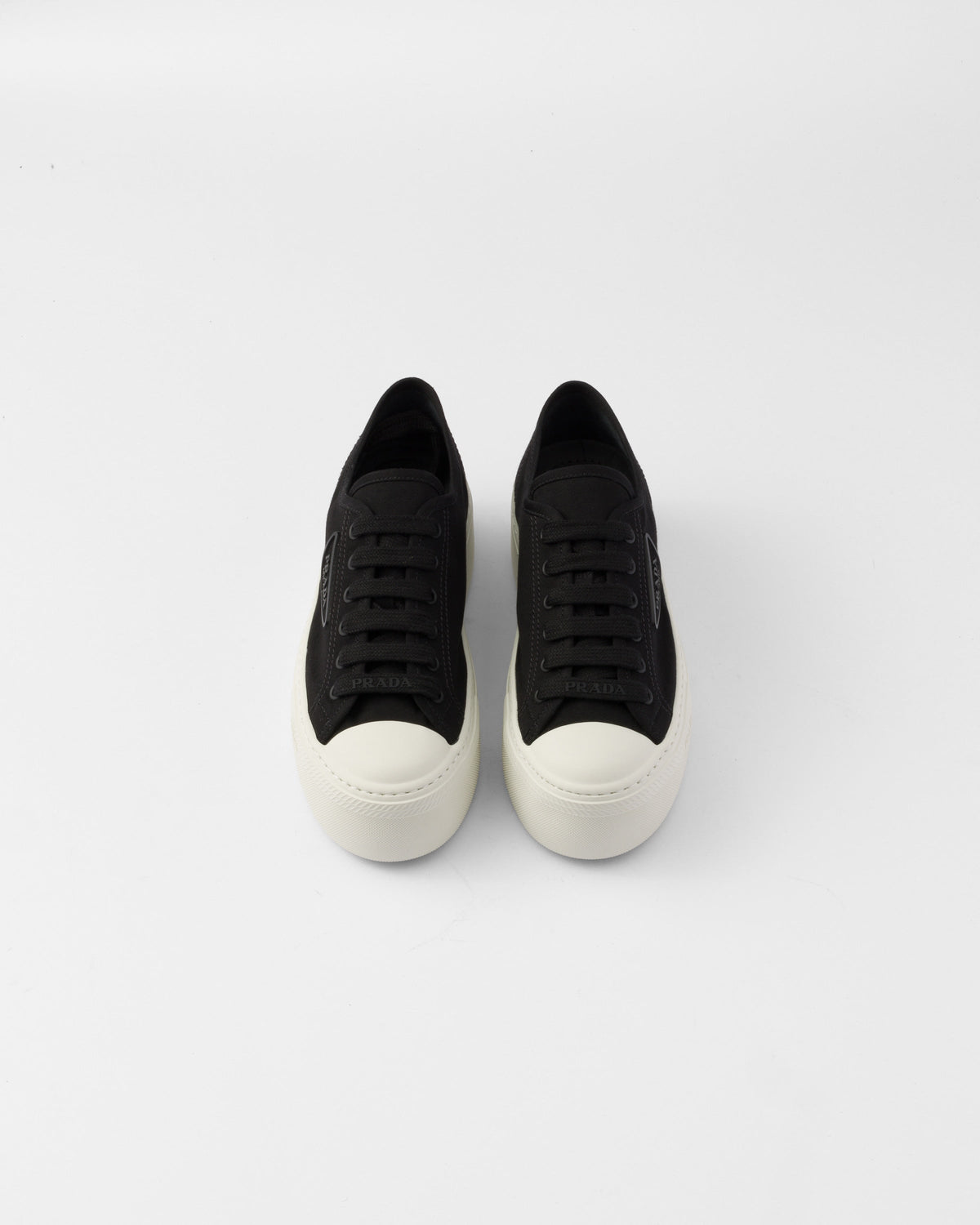 Fabric sneakers – upper with rubber toe cap Leather lining--Embossed rubber triangle logo Logo-print – LUX VERSE Luxury Designer Fashion Outlet