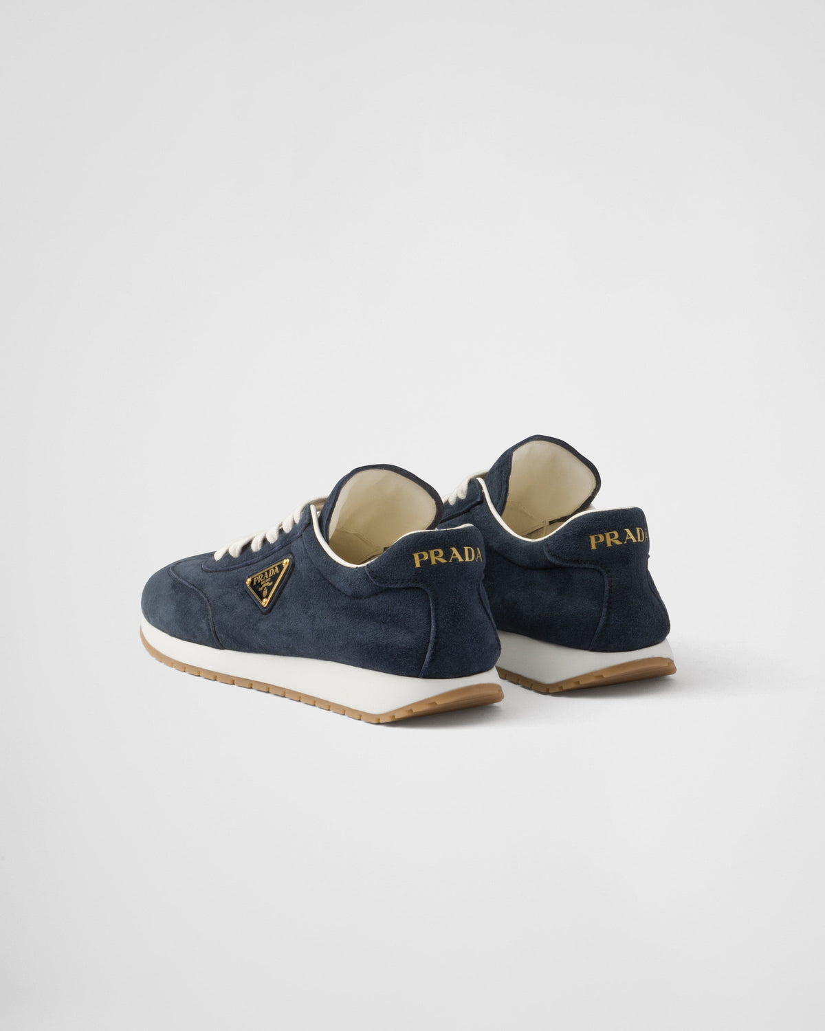 Suede Leather sneakers – the iconic enameled metal triangle logo embellishes the suede upper that combines – LUX VERSE Luxury Designer Fashion Outlet