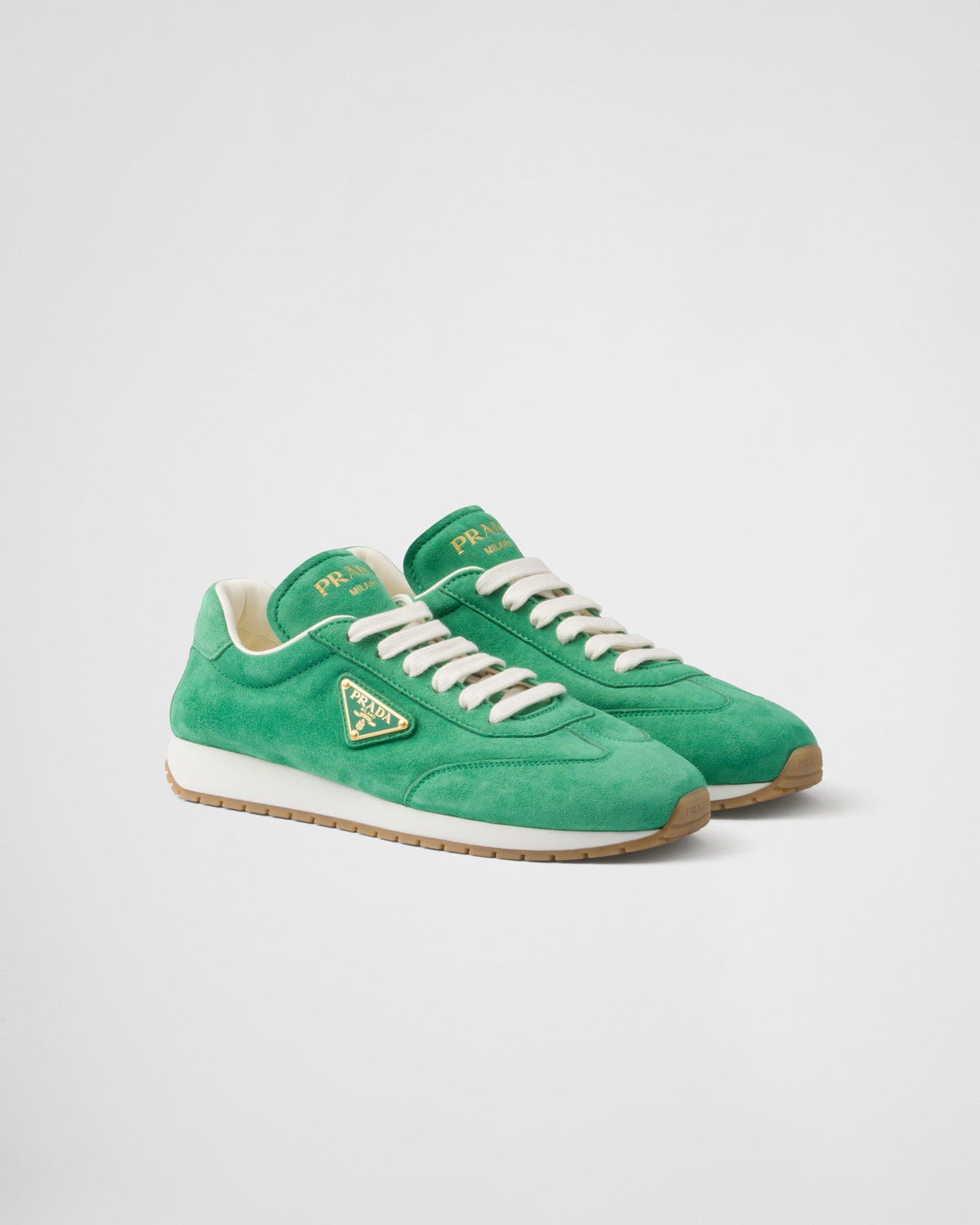 Suede rubber sneakers – the versatile style is completed by the enameled metal triangle logo that – LUX VERSE Luxury Designer Fashion Outlet