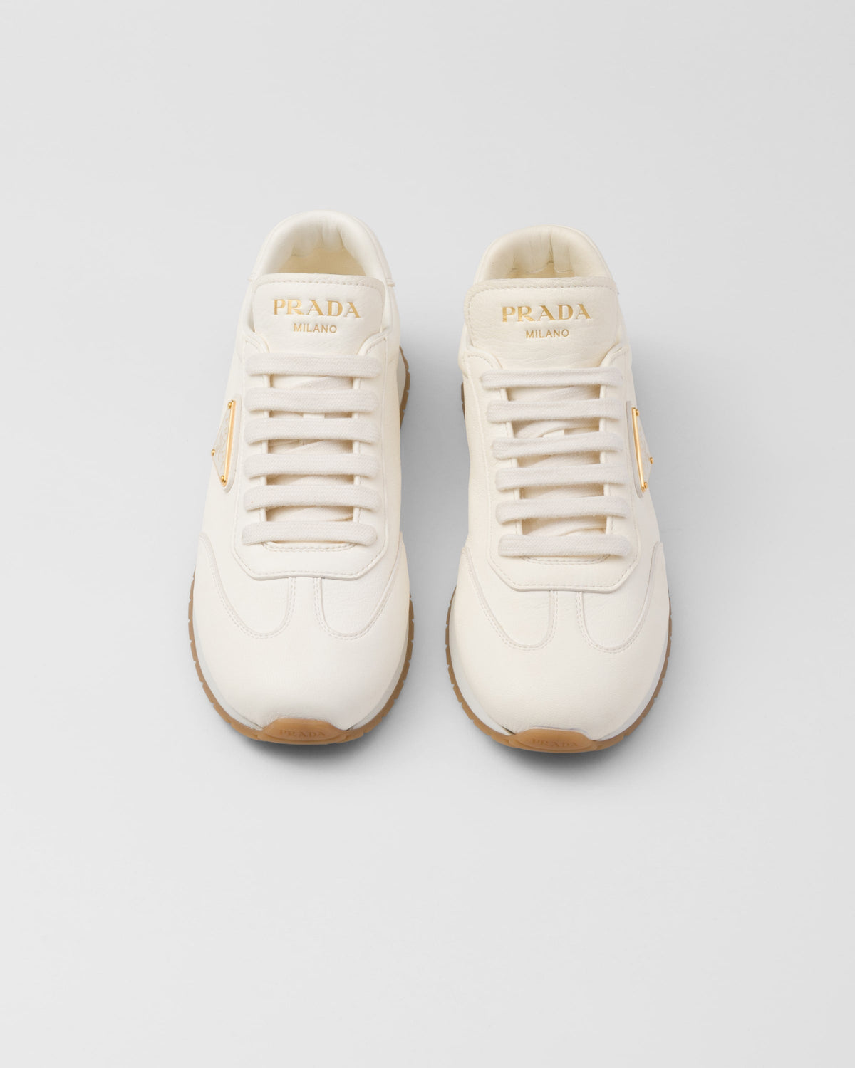 Versatile leather sneakers – leather lining Enameled metal triangle logo Closure with cotton laces Rubber sole, – LUX VERSE Luxury Designer Fashion Outlet