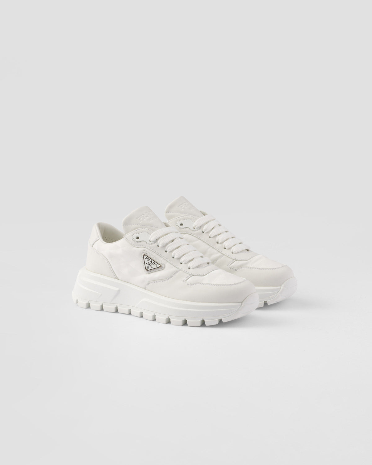 PRAX 01 Re-Nylon sneakers – chunky rubber lug soles complete the sporty silhouette – LUX VERSE Luxury Designer Fashion Outlet