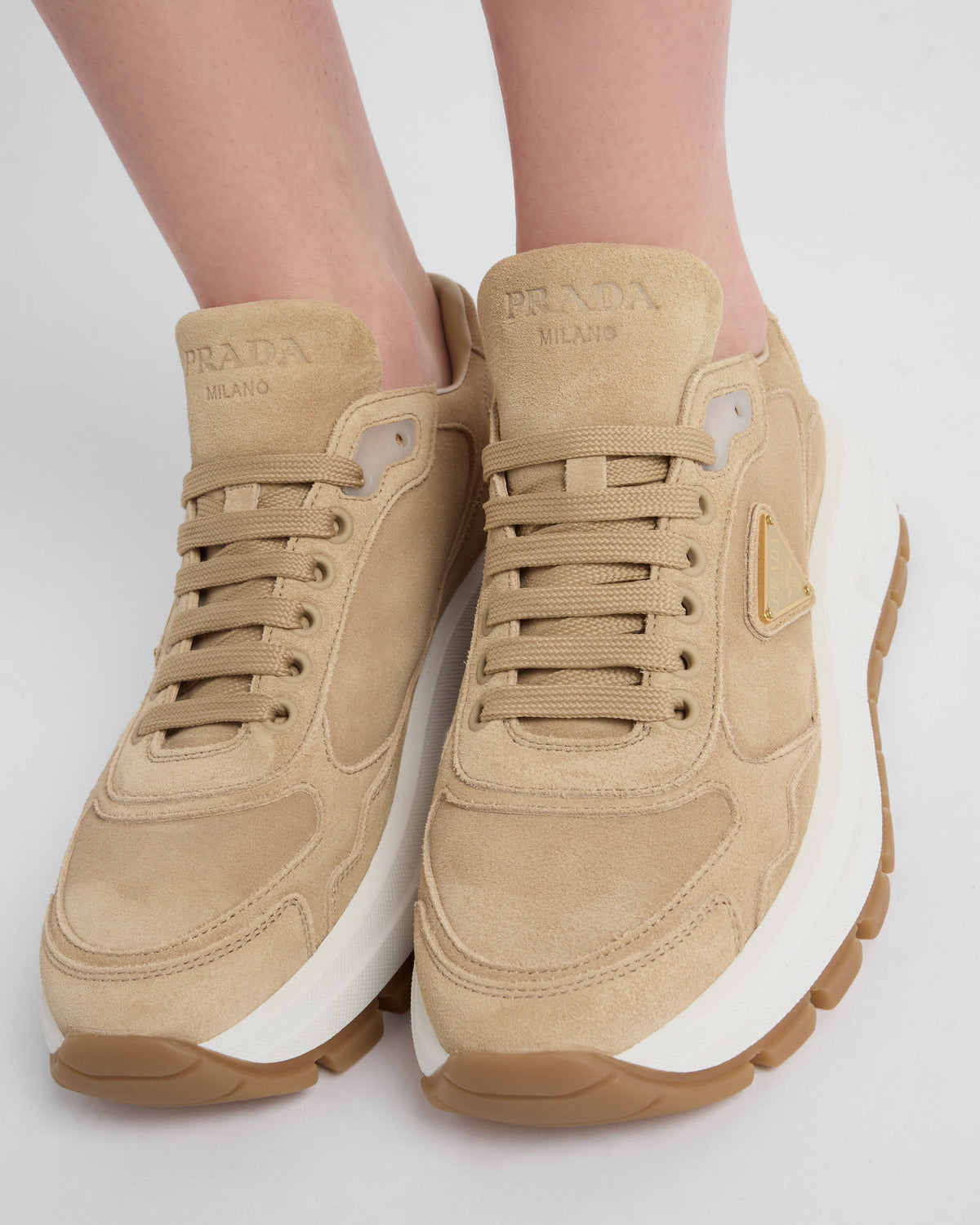 PRAX 01 suede sneakers – the enameled metal triangle logo embellishes these sporty suede shoes completed – LUX VERSE Luxury Designer Fashion Outlet
