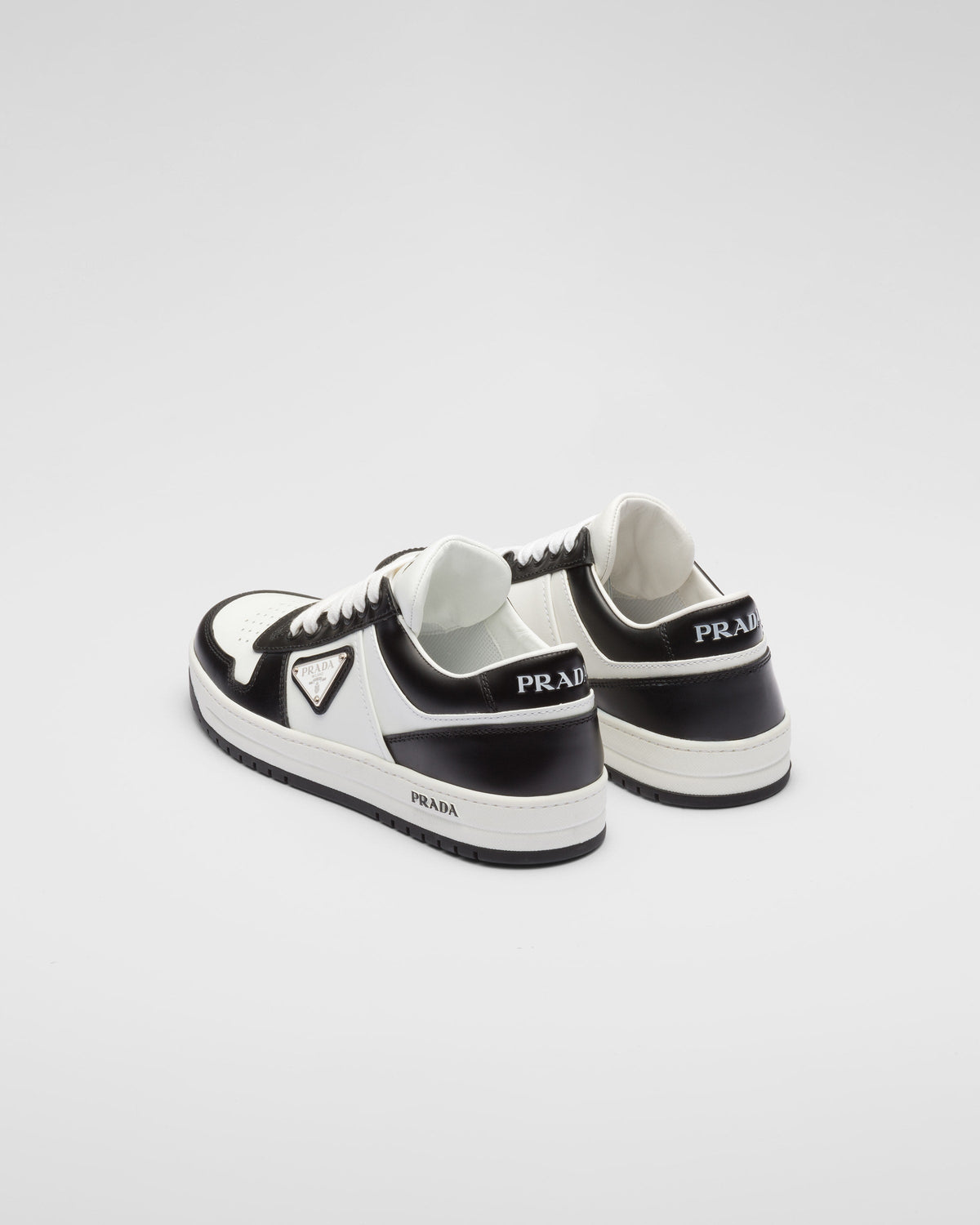 Downtown perforated leather sneakers – these sporty sneakers made of perforated leather feature various interpretations – LUX VERSE Luxury Designer Fashion Outlet
