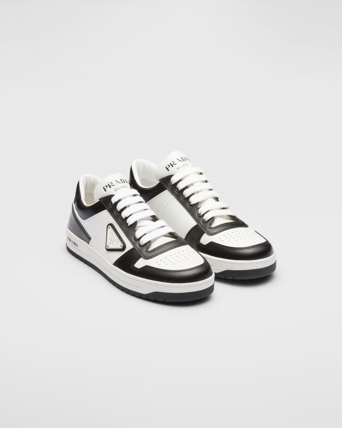 Downtown perforated leather sneakers – these sporty sneakers made of perforated leather feature various interpretations – LUX VERSE Luxury Designer Fashion Outlet
