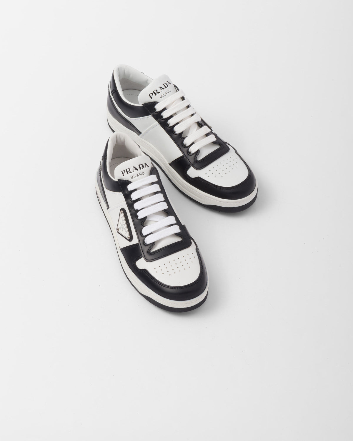 Downtown perforated leather sneakers – these sporty sneakers made of perforated leather feature various interpretations – LUX VERSE Luxury Designer Fashion Outlet