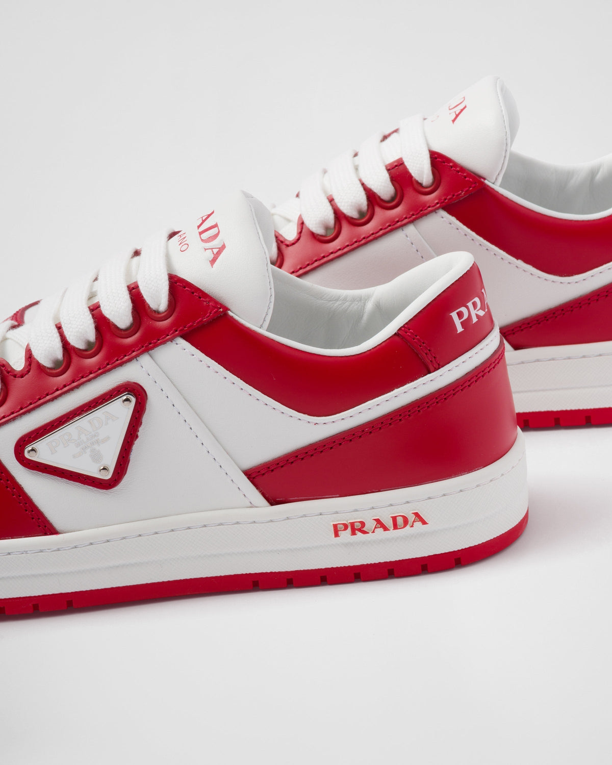 Downtown sporty leather sneakers – these sporty leather sneakers are embellished with different interpretations of – LUX VERSE Luxury Designer Fashion Outlet