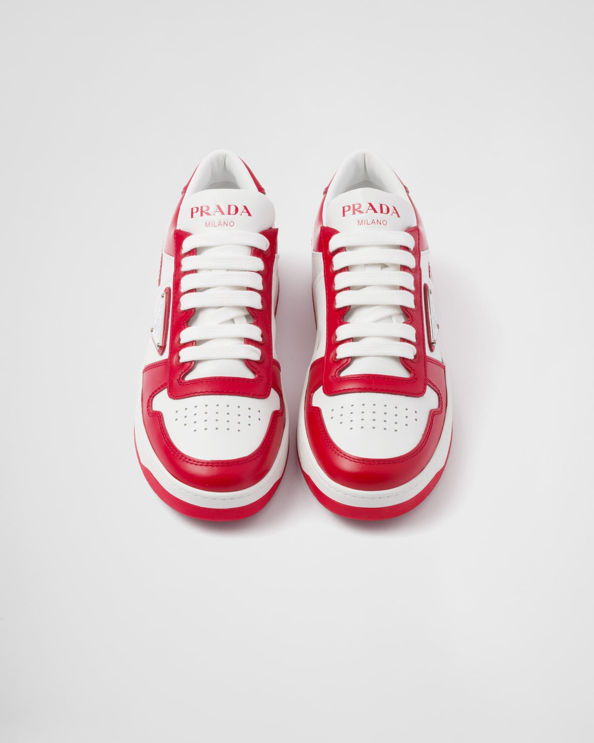 Downtown sporty leather sneakers – perforated motif on the upper Leather lining Enameled metal triangle logo Lace-ups – LUX VERSE Luxury Designer Fashion Outlet