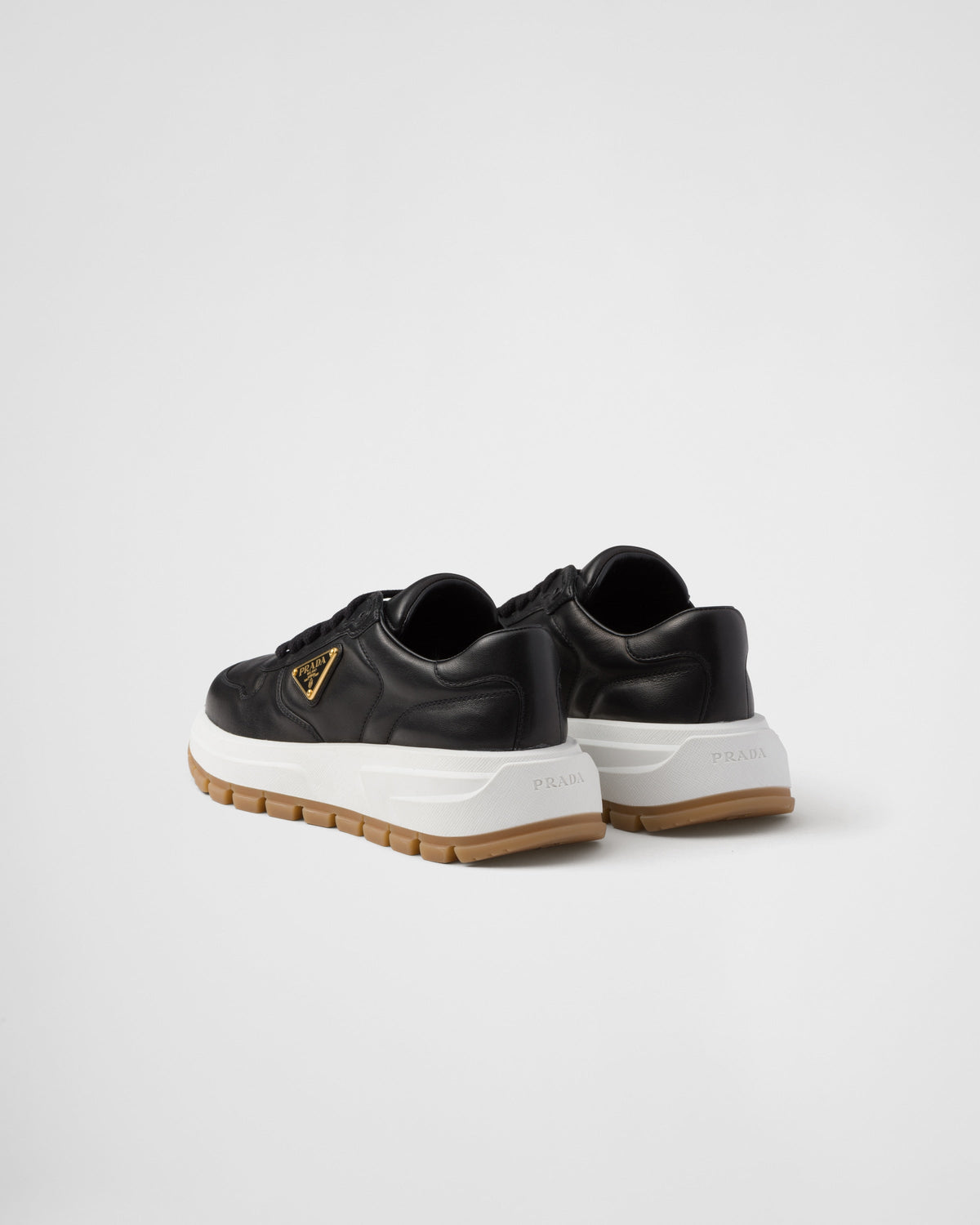 Leather silhouette sneakers – these leather sneakers with a sporty silhouette and pragmatic, modern design are – LUX VERSE Luxury Designer Fashion Outlet