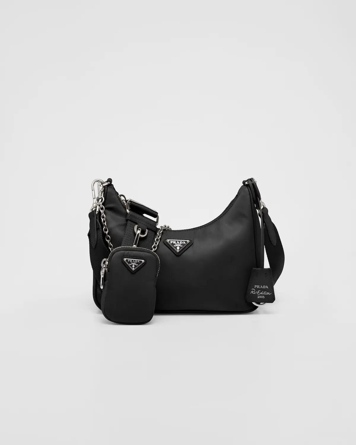 Re-Edition 2005 Re-Nylon bag – this versatile bag with Saffiano leather trim comes with a detachable pouch attached – LUX VERSE Luxury Designer Fashion Outlet