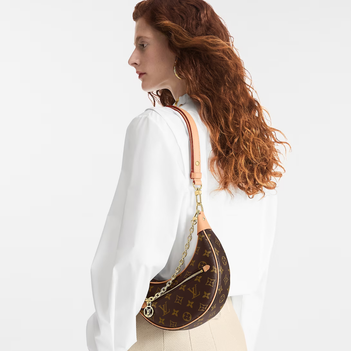 Loop Handbag – created by Nicolas Ghesquière for the Cruise Collection, the Loop handbag features – LUX VERSE Luxury Designer Fashion Outlet