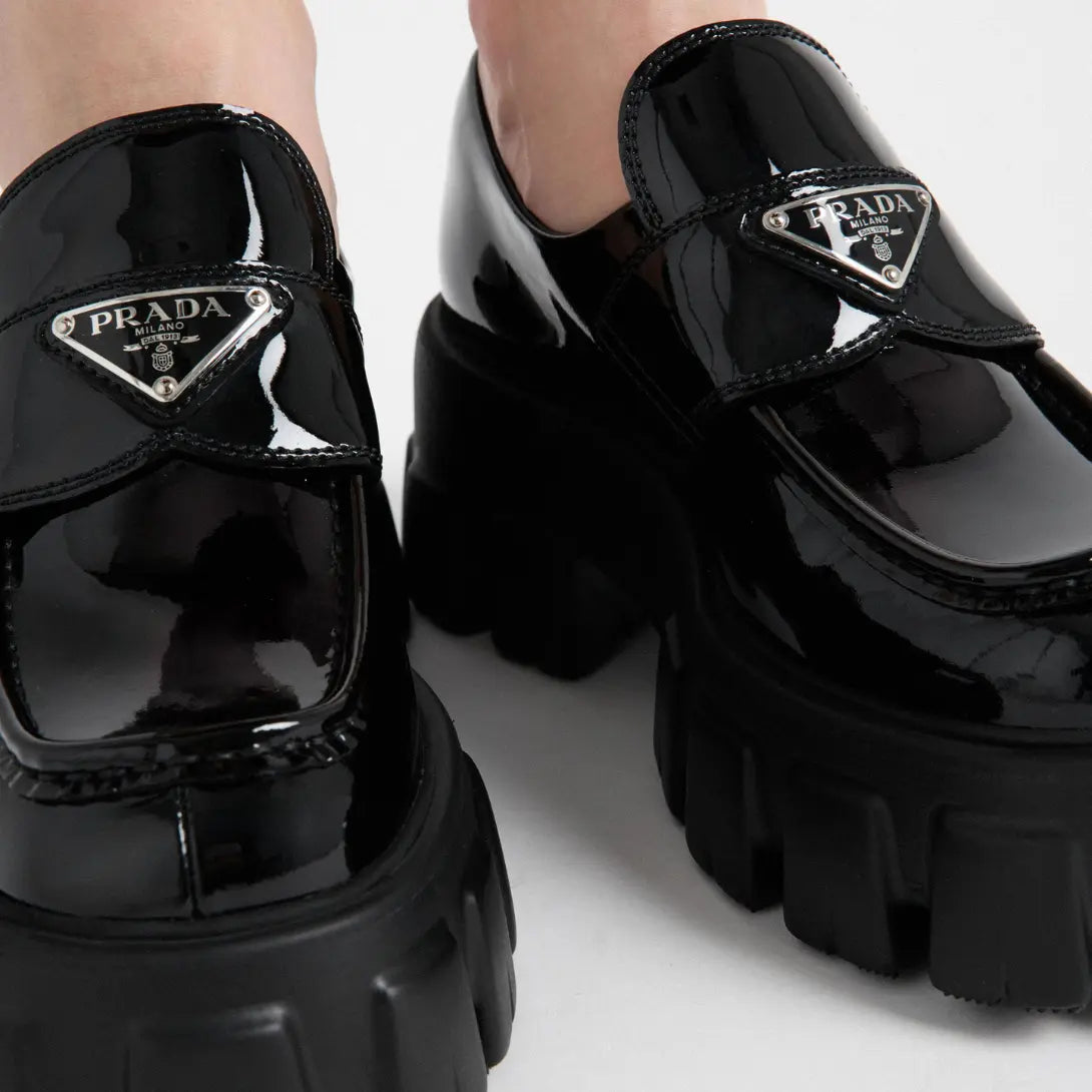 Monolith patent leather loafers – upper with leather band and metal triangle logo Apron with stitched raised edge – LUX VERSE Luxury Designer Fashion Outlet