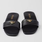 Leather slides – enameled metal triangle logo Monoblock leather sole, 5 mm, with hot-stamped logo – LUX VERSE Luxury Designer Fashion Outlet