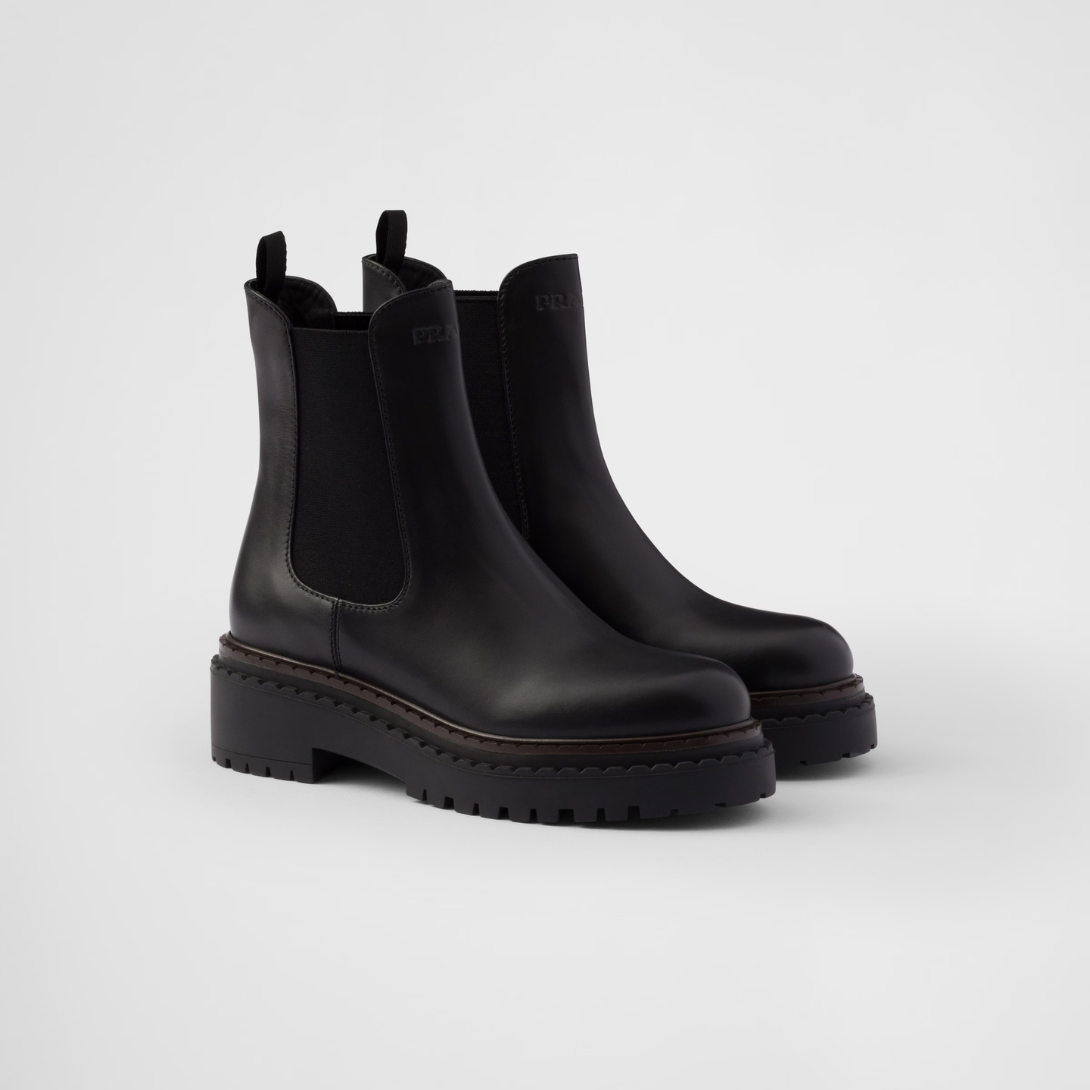 Leather Chelsea boots – a hybrid silhouette blending classic details and contemporary touches defines these – LUX VERSE Luxury Designer Fashion Outlet