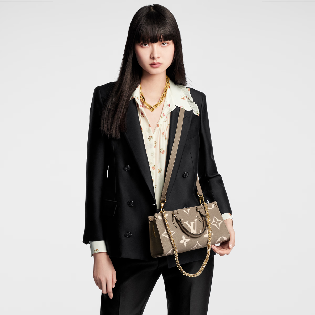 OnTheGo East West B – made from Monogram Empreinte leather embossed with a tonal Giant Monogram motif, – LUX VERSE Luxury Designer Fashion Outlet
