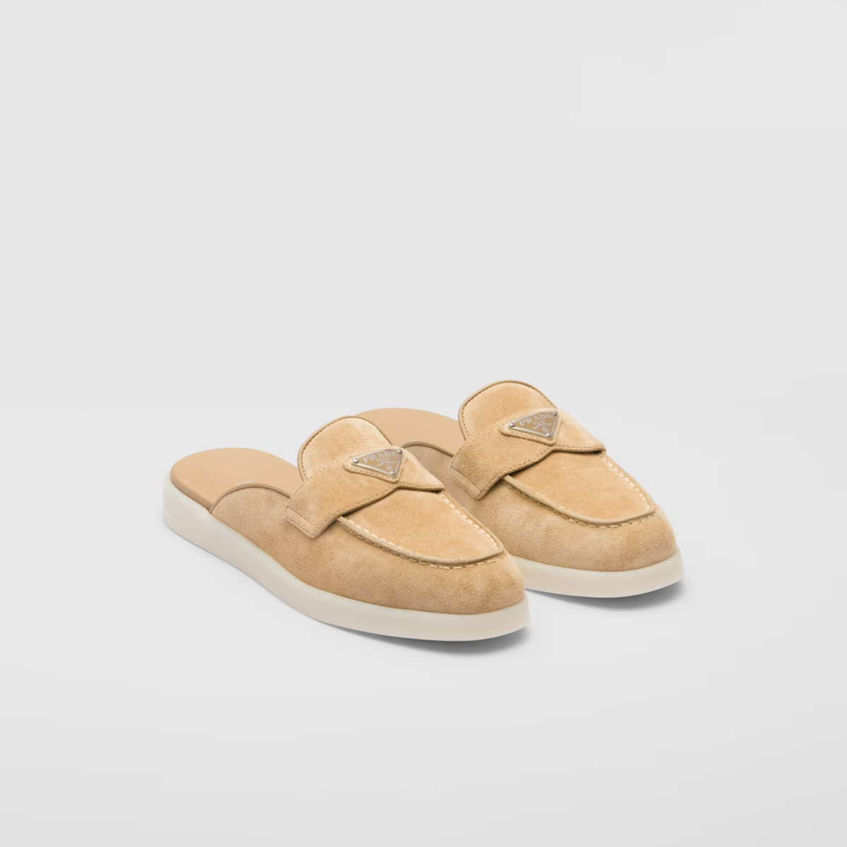 Suede mules – the enameled metal triangle logo embellishes the band, while the rubber sole adds – LUX VERSE Luxury Designer Fashion Outlet