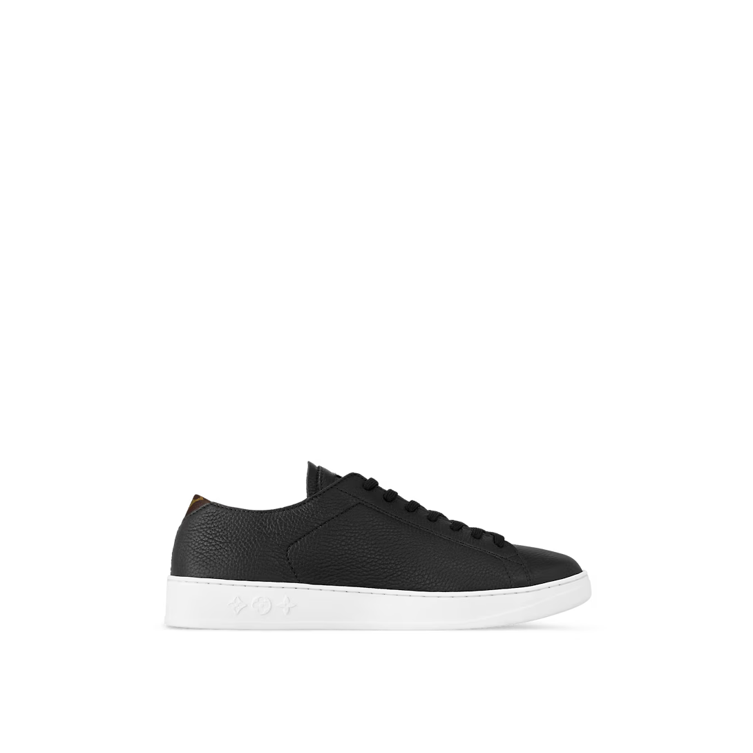 Resort Sneaker – its understated design is complemented by discreet signatures, including – LUX VERSE Luxury Designer Fashion Outlet